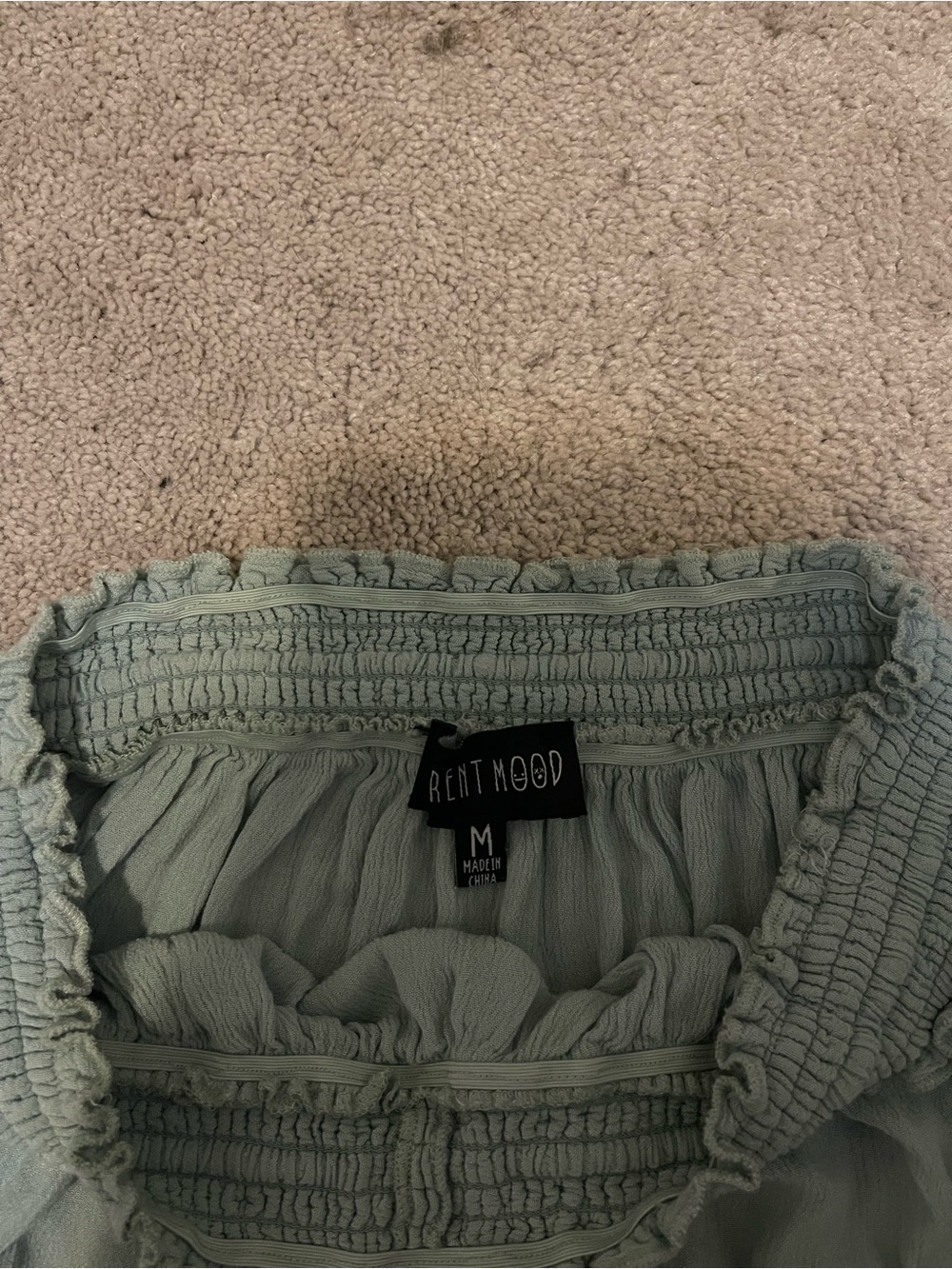 Smocked Waist Ruffle Mini Skirt in Sage - Picture 2 of 4